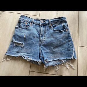 Levi’s high waisted jean shorts ripped 27W